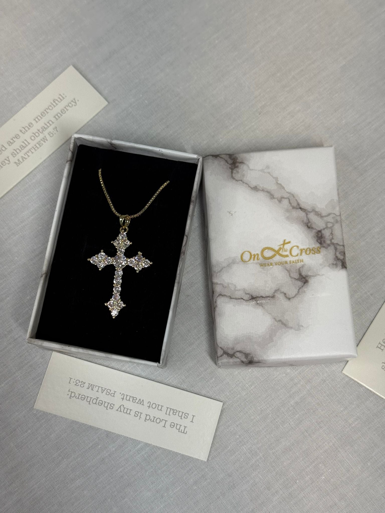 Elegant Women’s Golden-Tone Cross Pendant Necklace.