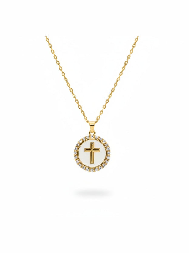 Woman’s Gold plated round cross pendant.